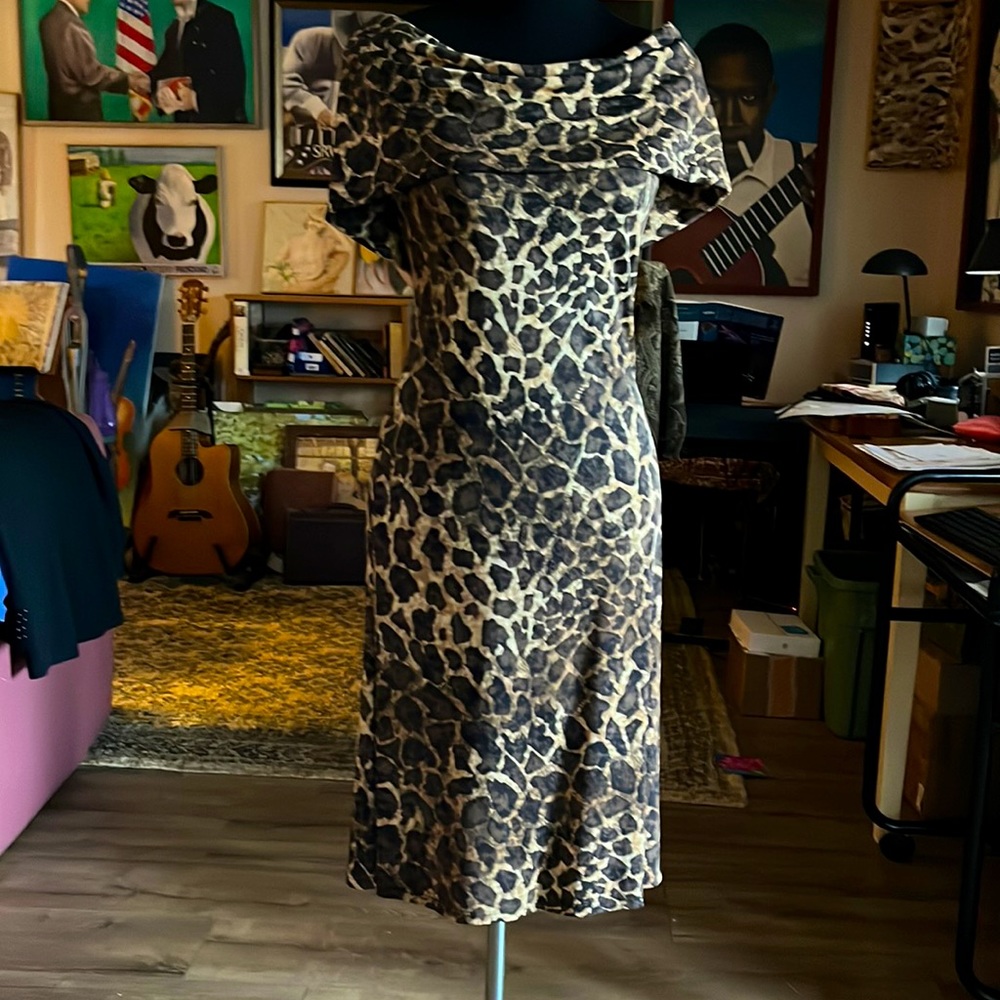 Giraffe print off the shoulder dress.